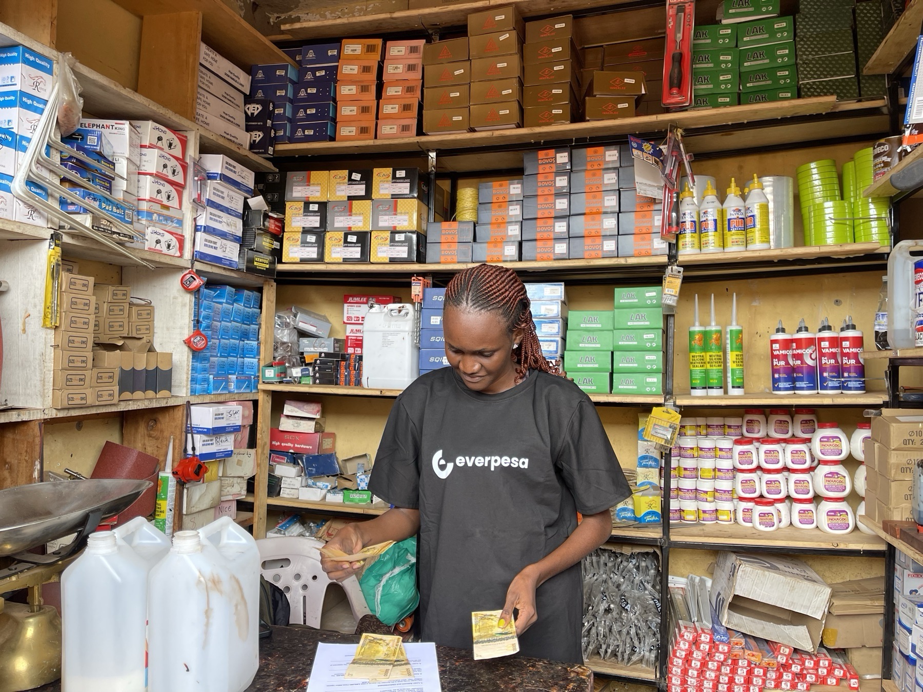 Shopkeeper Real Everpesa — Affordable digital credit. Real returns. Real impact.